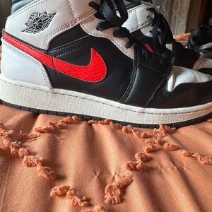 Air Jordan 1 Mid Black and Red Sneakers